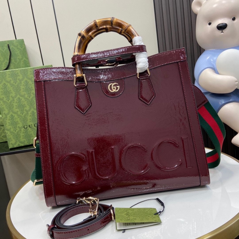 G*u*i shopping bags